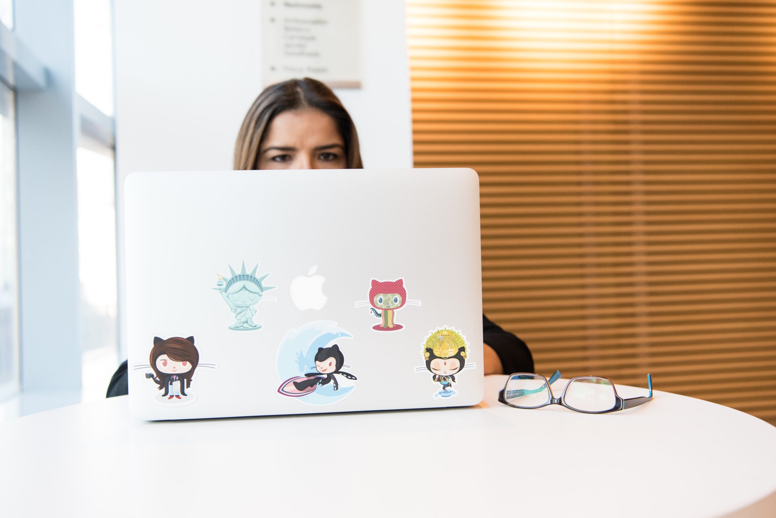 accountant working with on her white laptop