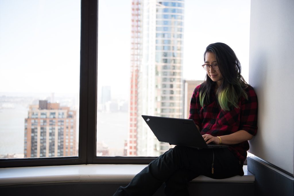 Accountant freelancer working by the window