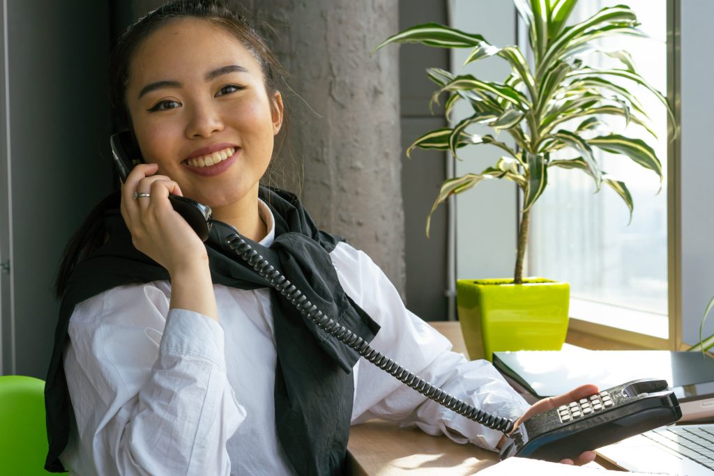 accountant happily taking a call