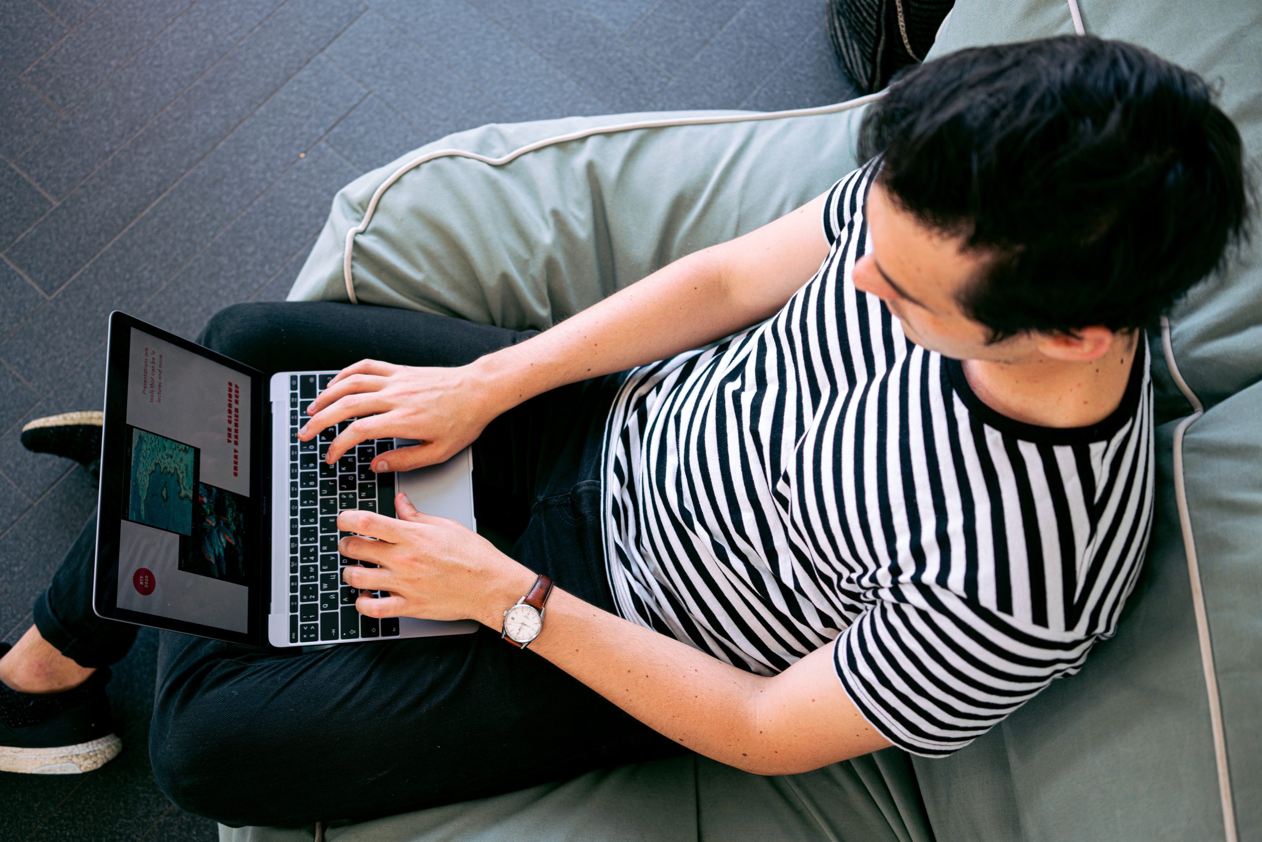 accountant sitting on a couch while making a presentation