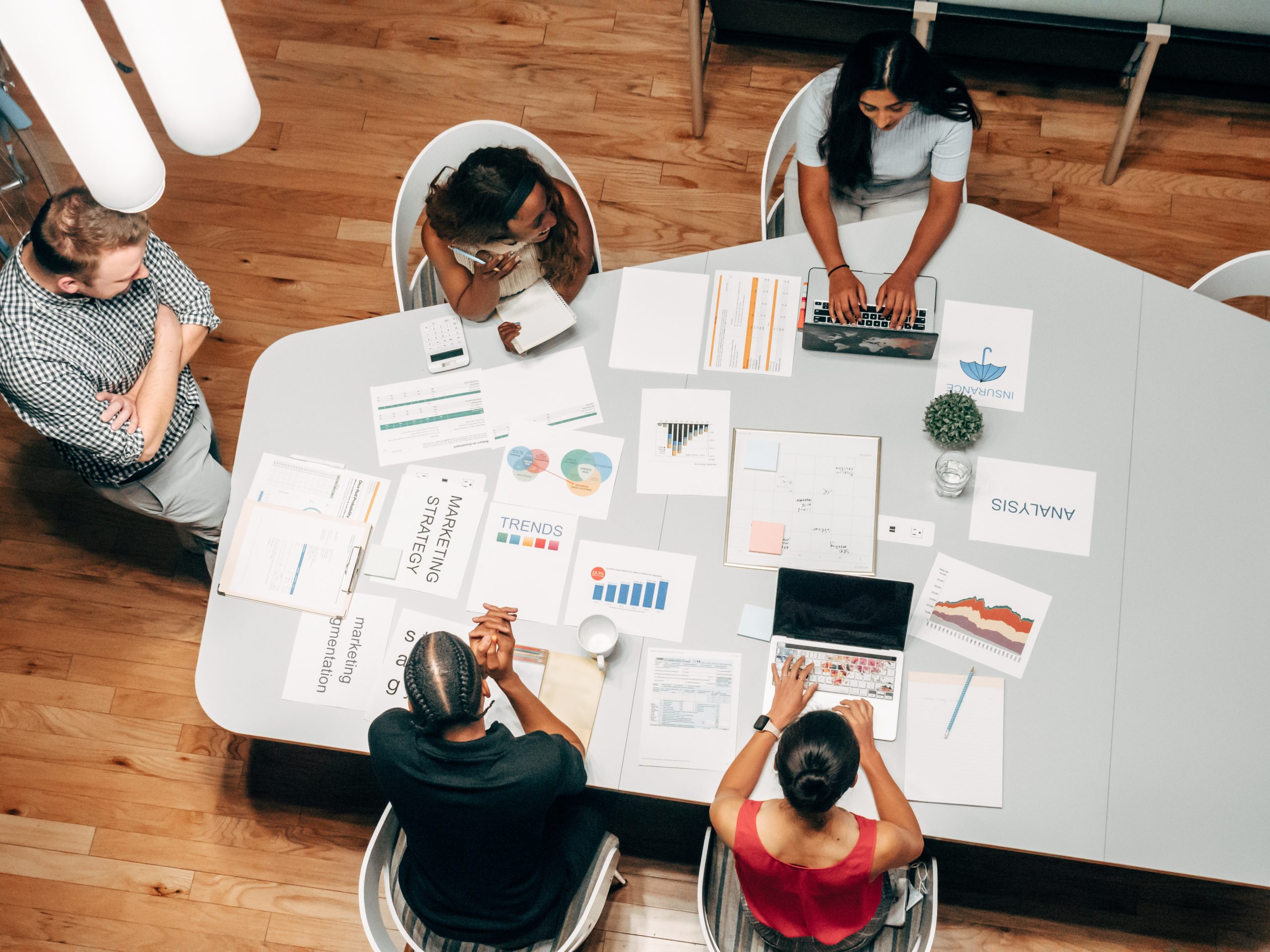 top view shot of an accounting firms marketing team