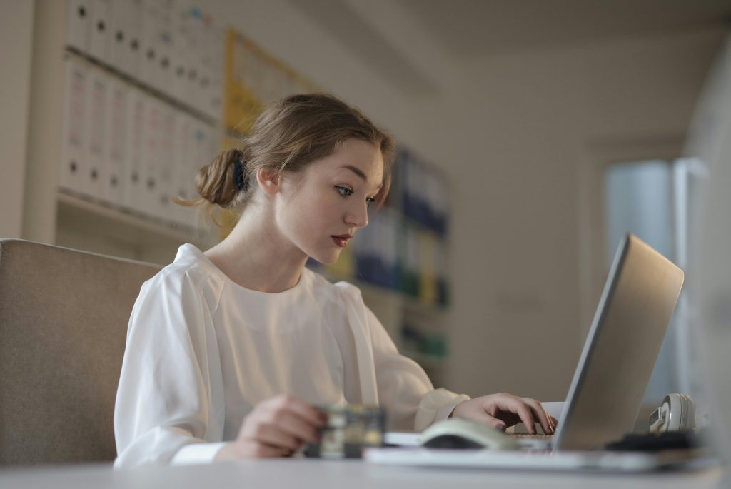 accountant looking at her laptop while working