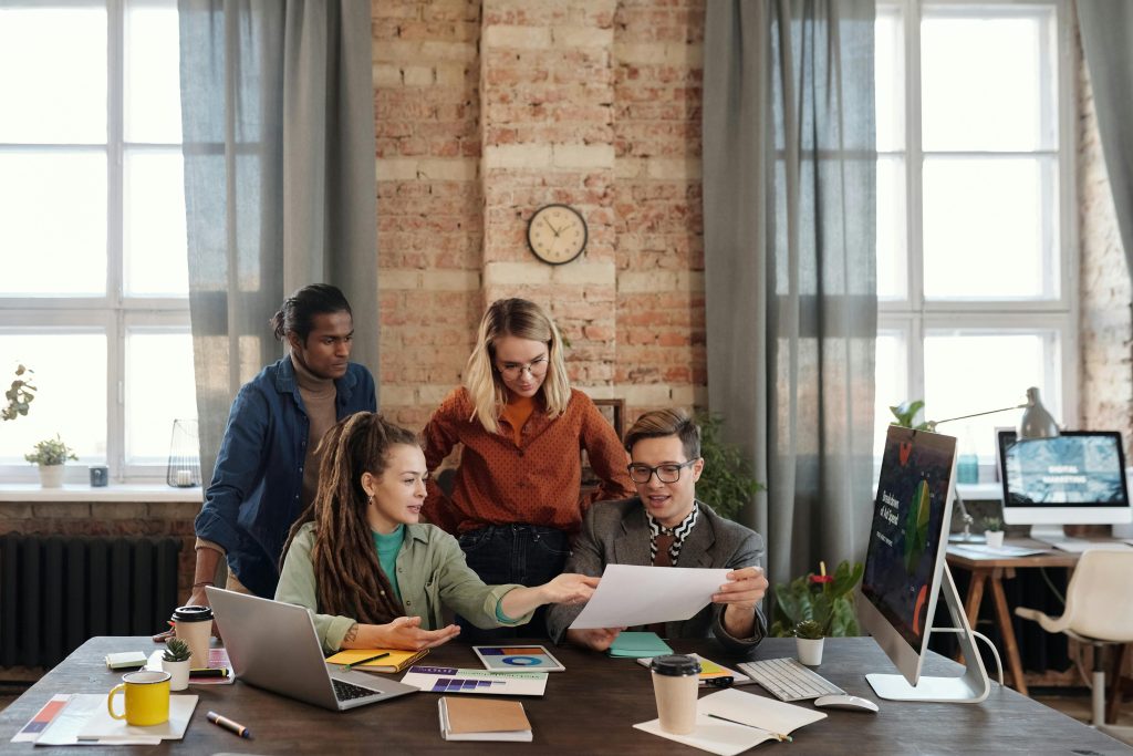 accountants having a meeting on a wooden table