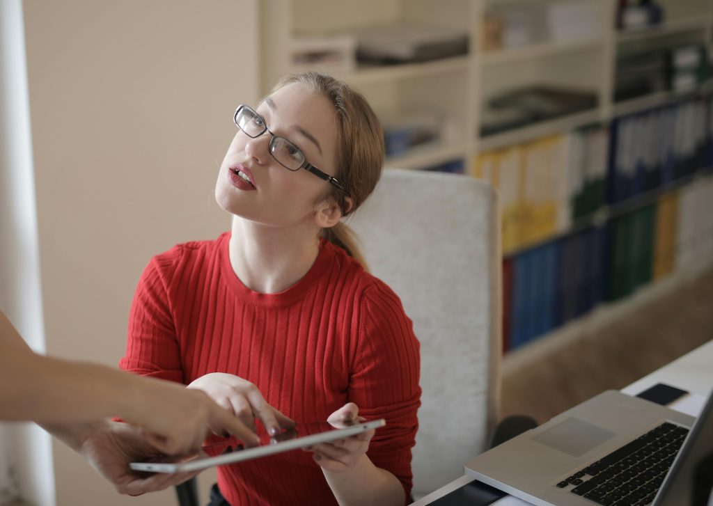 accountant taking instructions from her superior