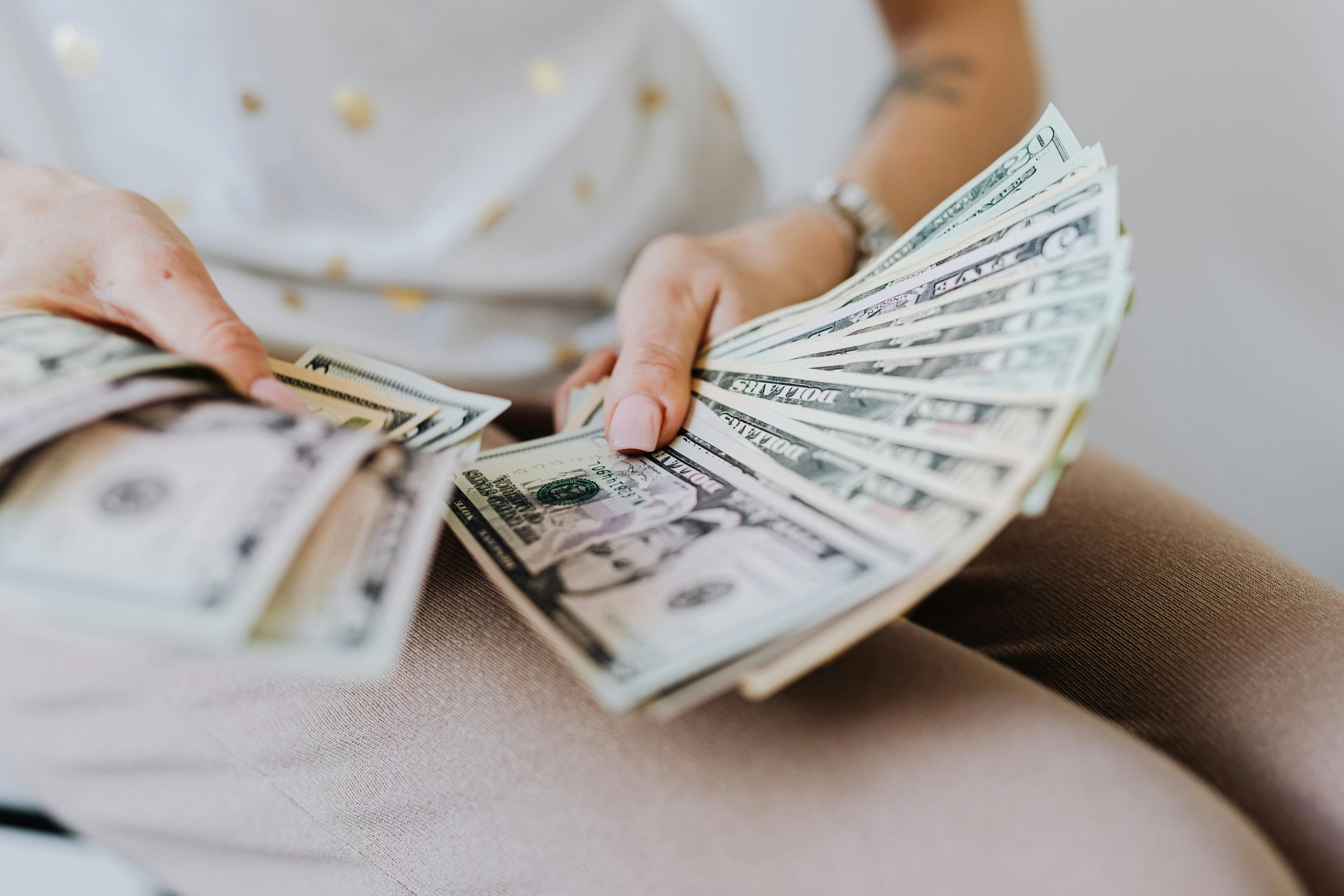 business owner counting paper bills