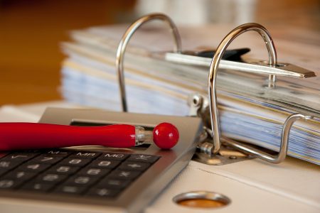 calculator and a file folder