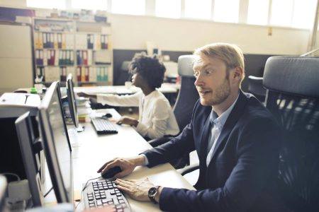 two accountants working in an office