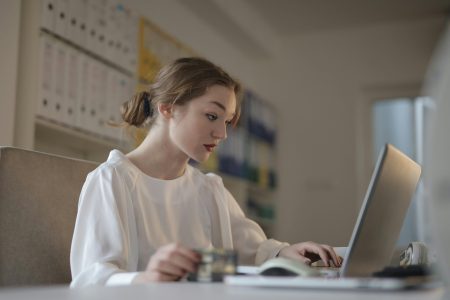 accountant looking at her laptop while working