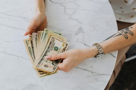 business owner counting paper bills